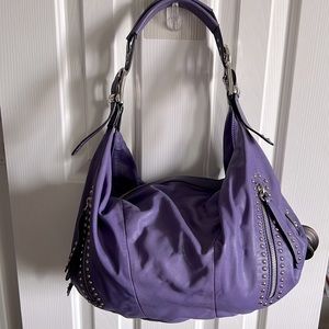 B. Makowsky genuine leather hobo style bag.